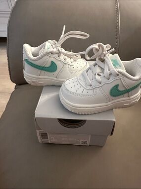 Nike Kids White Sneakers with Teal Accent